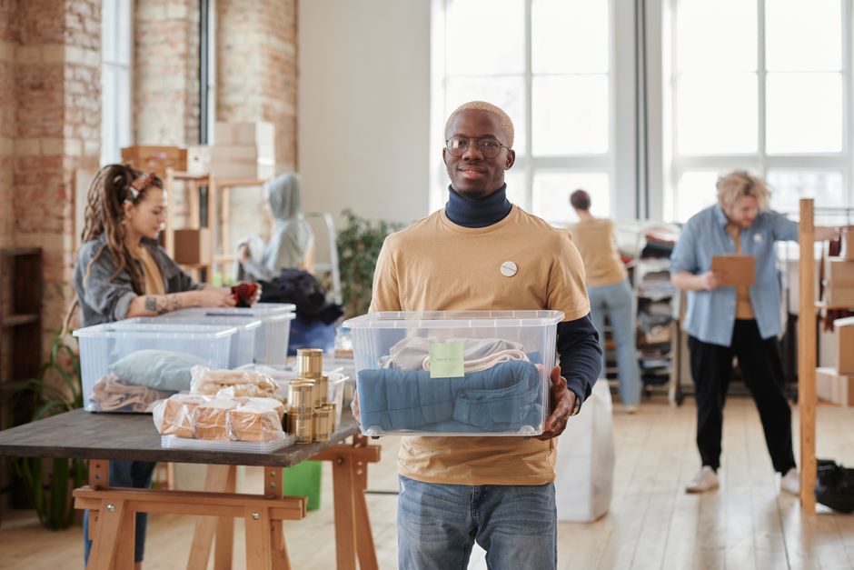 Volunteers organizing donations at a community center