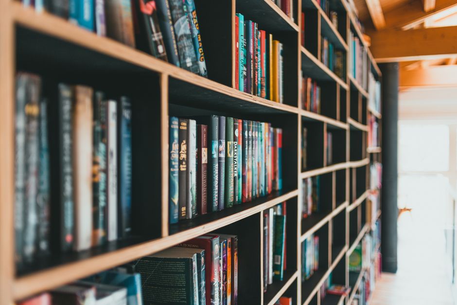 Shelves of library books in a study room