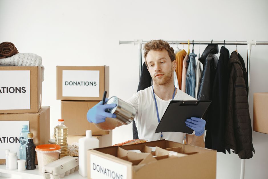 Volunteers sorting donations at a community center